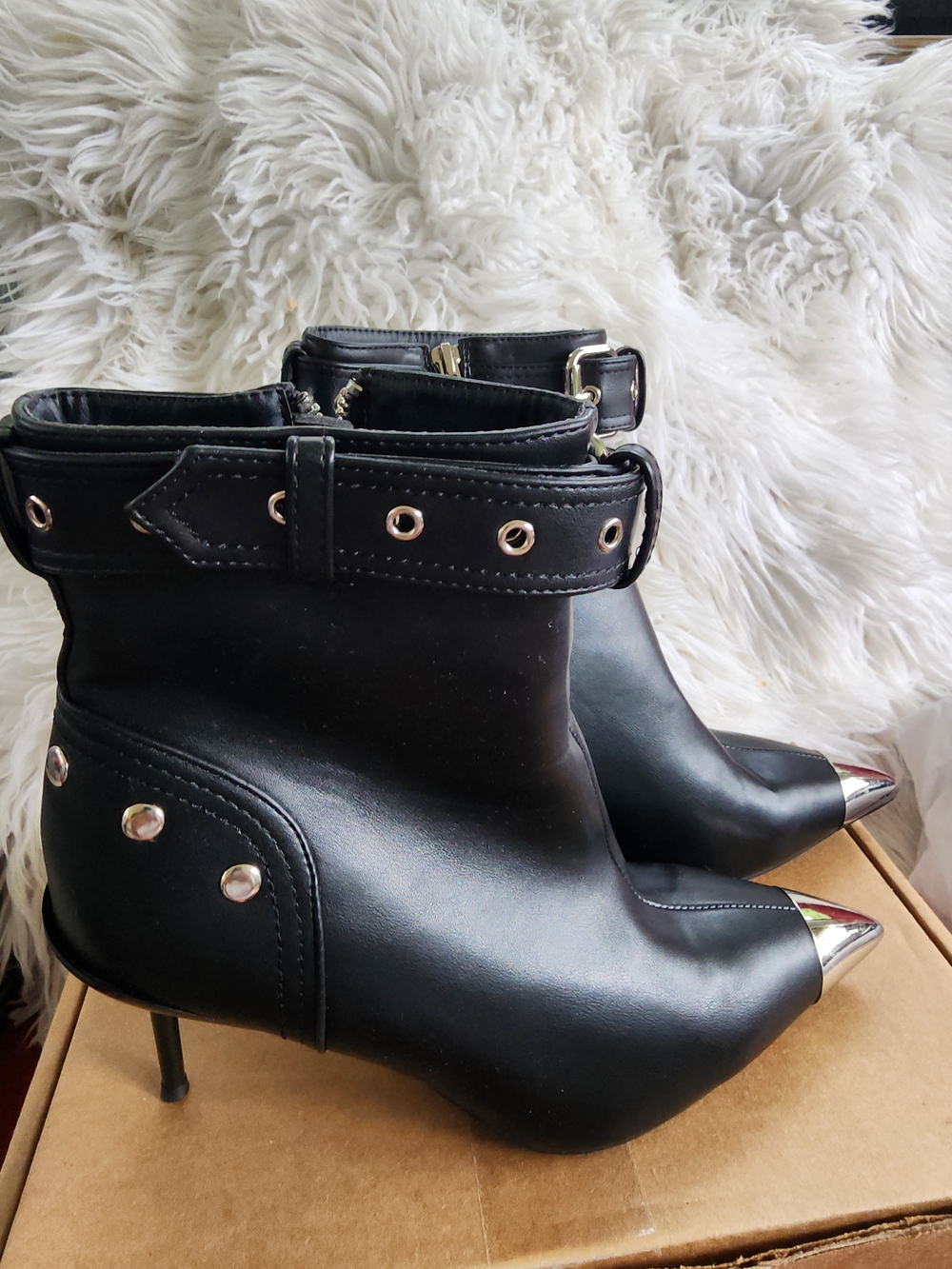 Sleek Black Ankle Booties with Silver Cap Toe and Stud Details